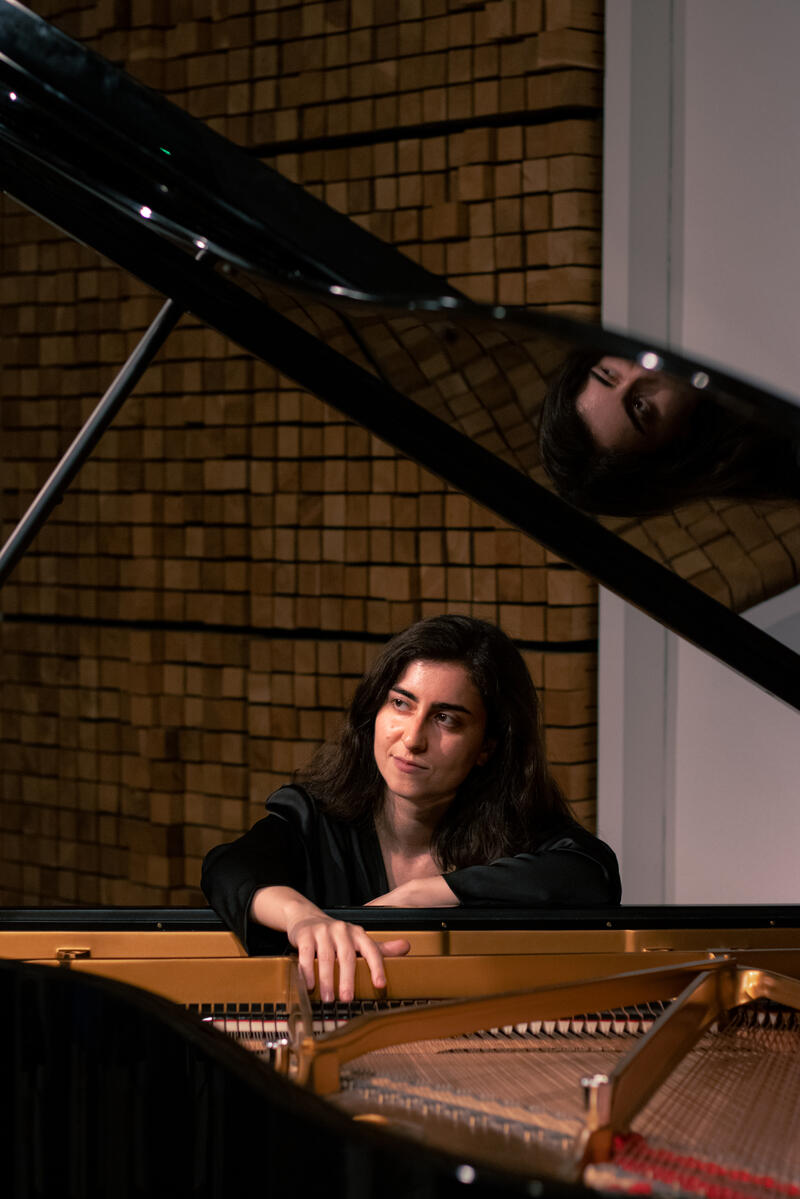 Roni Levy Pianist Profile with piano